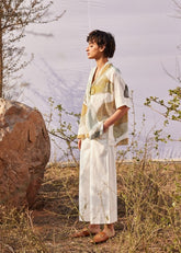 A Model Wearing White Cotton Mul Verdure Twill Pants,curated by Only Ethikal